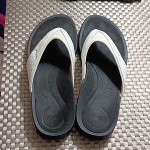 Black and white flip flops